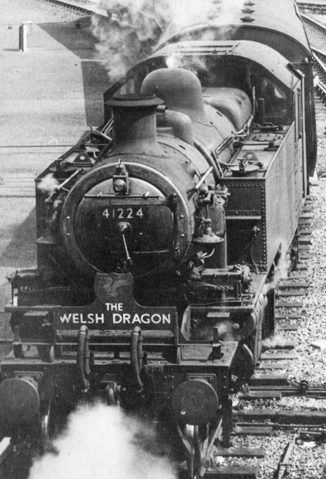 The Welsh Dragon was given to the Rhyl-Llandudno push-pull shuttle service introduced in the late 1950s to serve the coastal resorts.  The unusually shaped headboard was mounted on the outer buffer beam lamp brackets and the three suburban carriages carried matching roof boards.  Provision of motive power was the responsibility of Rhyl shed (6K) and 41224 is seen here approaching Llandudno Junction for Rhyl.