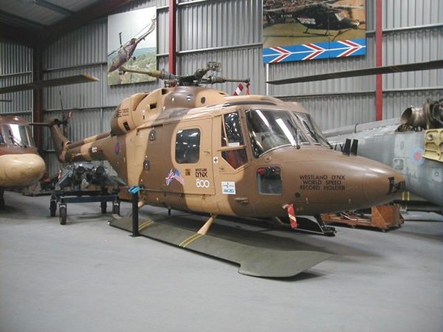 A specially modified Westland Lynx 800 - ZB-500 - first flown in May 1979 - with British Experimental Rotor Programme blades (now standard on all new Lynxes) and the civilian registration G-LYNX, also set the absolute speed record for helicopters over the Somerset Levels on 11 August 1986. The aircraft  - pictured above - was piloted by Trevor Egginton alongside flight test engineer Derek Clews and reached a speed of 249.09 mph (400.87 km/h) to take the 228.9 mph record set by a heavily modified  Mil Mi-24 Hind in September 1978.  