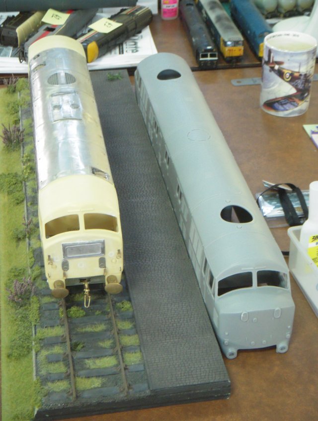 With the ready to run Dapol 00 Class 22 B-B finding homes on a number of layouts at St Margaret's Hall it was interesting to see a much larger scale version as part of the traditional modelling demonstration alongside its  antecedent, the D600 series "Warship".  While both North British Locomotive diesel hydraulics will require more work to be layout ready though, Presflo cement wagon B888581 was ready to roll and a "Clayton" Class 17 was not far behind.