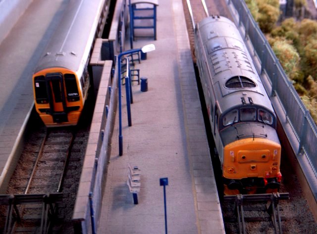 Set in the EWS era of the early years of the 21st Century, the upper level of Anderstaff Yard was a truncated passenger line with a shuttle service of modern DMUs into the terminus at the left, while the lower level featured a yard handling steel goods and engineer's trains.  The layout was offered for sale at the end of the exhibition and has happily been bought by a pair of local enthusiasts - so we may be seeing it at St Margaret's Hall again in the future.