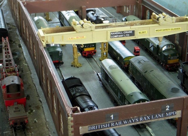 Rax Lane represented a weathered engine shed during the 1960 - 1967 transition from steam to diesel power and although loosely based on 1A Willesden hosted as many as 40 locomotives from all over Britain at any one time - some complete with sound chips.  The depot's own breakdown train was also visible as were wagons brining in supplies of solid and liquid fuel and spare parts.