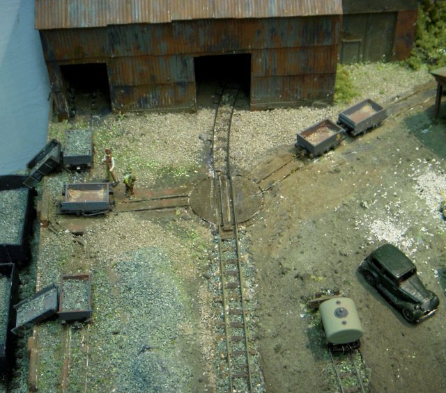 The layout was set around 1950 and featured both steam and diesel Paul Windle locomotives running on 2' 3" gauge and making a vertical connection with the Midland Railway.