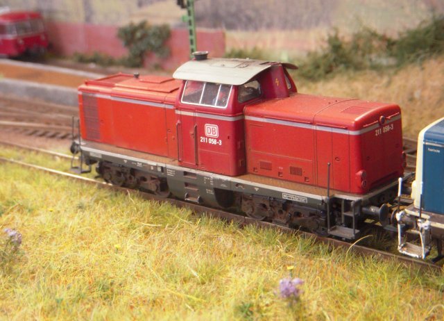 Bad Horn represented a branch line terminus in the Teutoburg Forest in the Central German Uplands around the year 2000.  The stations saw passenger trains from Paderborn formed of railcars or push-pull coaches as well as wagonload freight services.  Although the railways of Germany had been unified a few years previously, the rolling stock was still predominantly of Bundesbahn origin and still carrying West German liveries.  The trackwork was by Piko, the working signals by Viessmann and DCC train control by Roco.  The layout can also be operated with Deutsche Reichsbahn stock to represent the Ore Mountains in Saxony although strictly speaking the signals would be incorrect for this area.