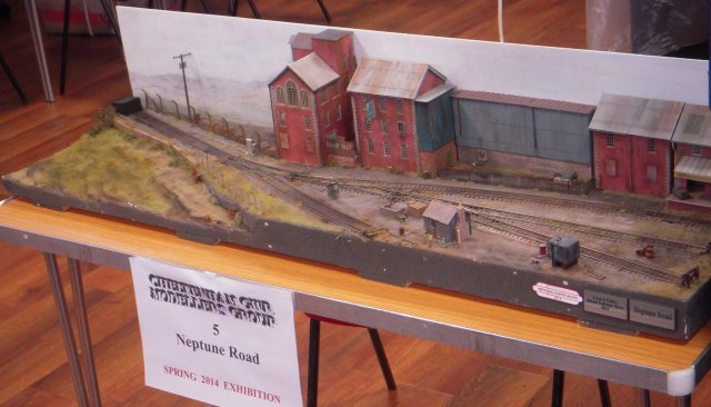 Neptune Road was a small sound-chipped DCC operated inglenook shunting puzzle with steam and diesel motive power from the 1960s, put perhaps more remarkably it was made from a single sculpted block of expanded polyurethane stiffened on the underside with wood.