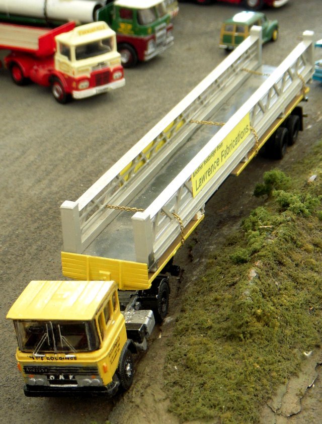 The Mellor Brother's well loved display of road transport included a matching Atkinson 6x2 cab unit and curtainside trailer in the eye-catching red and white of Stoke Orchard, Chelternham, based storage and distribution experts Santa Fe Express.  Leaving the River View Transport Cafe meanwhile was a footbridge girder load from Lawrence Fabrications hauled by a two axle DAF in the highly visible markings of Wooton-Under-Edge based W.G. Goulding & Sons