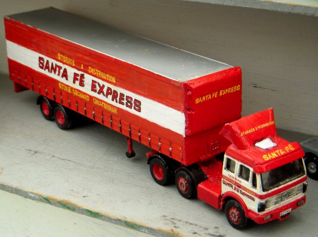 The Mellor Brother's well loved display of road transport included a matching Atkinson 6x2 cab unit and curtainside trailer in the eye-catching red and white of Stoke Orchard, Chelternham, based storage and distribution experts Santa Fe Express.  Leaving the River View Transport Cafe meanwhile was a footbridge girder load from Lawrence Fabrications hauled by a two axle DAF in the highly visible markings of Wooton-Under-Edge based W.G. Goulding & Sons.