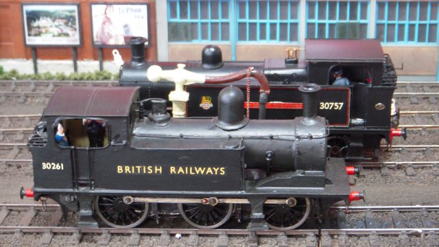 Pictured above are LMS designed "Black Five" and "Jubilee" 4-6-0s 45400 and 45638 "Zanzibar" as well as blue liveried GWR 4-6-0 "King Charles II" while below are six coupled Southern Railway tank engines 30261 and 30757.