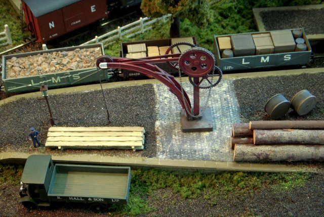 Bishopsmead represented a busy station located somewhere on the Western / Central division of the LMS in the mid 1930s. In effect it was a terminus both for the main part of the branch from the main line at the fictitious Castlebury Junction and also for the trailing sub-branch to Smallcombe. Thus all trains between Castlebury and Smallcombe had to reverse at Bishopsmead - including some Great Western interlopers! Castlebury and Smallcombe were represented by fiddle yards, a connection to an industrial area at Bishopsmead was modelled and all buildings and rolling stock were either kit, modified kit or scratch built.