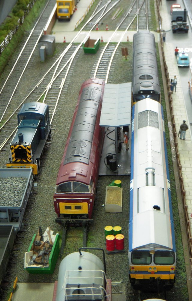 Figges Marsh TMD was a small DCC layout featuring diesel locomotives from maroon Warships and Westerns to blue and large logo British machines and the first General Motors Class 59.  The buildings were either kit or scratchbuilt.