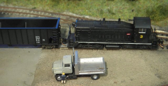 Set in the coal mining region of the Appalachians, Red River represented scenes from the last decade or so on what is now the Norfolk Southern (NS) railroad. The NS was the result of a merger between the Norfolk and Western and Southern Railroads. The Southern Railroad was noted for the efficiency of its operations and the Norfolk and Western for its coal hauling. 