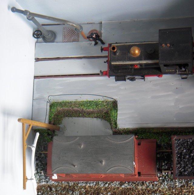 The level crossing having defined the right hand side of the diorama, the water crane and loading gauge were ready to do the same for the left hand extremity - the loading gauge base fitting in to the cut-out already described.  