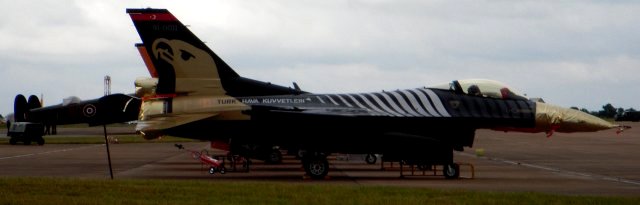 The USAF Europe F-16 pictured above belongs to the 52nd Fighter Wing based at Spangdahlem AFB in Germany while the "Solo Turk" seen below had its gold engine and nose covers applied all the time we were there.  Like the Battle of Britain Memorial Flight Avro Lancaster seen behind it, the F-16C must have been scheduled for a later departure.