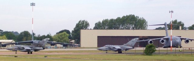 Paul also photographed these two Panavia Tornados taxiing past a USAF C-17 Globemaster four-jet transport and an older Boeing aircraft strongly associated with Fairford, the eight engined B-52 Stratofortress.  
