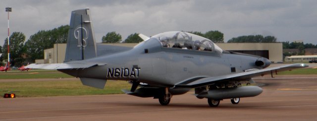 The American civilian registered N610AT seen at Fairford is an experimental light attack aircraft with six underwing hard points based on the single turboprop T-6A Texan II two-seat primary trainer, adopted by both the USAF and US Navy.  