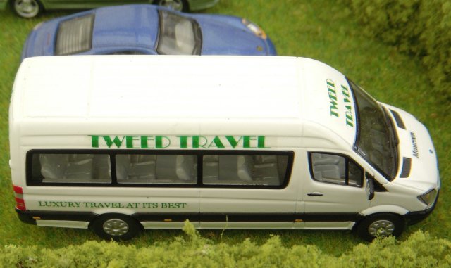 Just up the lane from this breach of the Highway Code, two Bachmann police officers were having a conversation next to their Mercedes people carrier although spectators might have noticed that the video-equipped vehicle was left hand drive, revealing its Continental origins.  Just over the hedge in another field meanwhile was Vincent's own right hand drive Mercedes minibus in the Code 3 markings of Tweed Travel and named after his good lady wife Maureen.