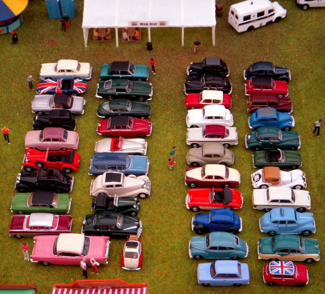 The atmosphere of the show was augmented, too, by the beer tent (seen above beyond the classic car display) and the fairground side shows - a trademark of Martin Nash who helped Vincent create his Southdowns Bus Rally and Vintage Show diorama.