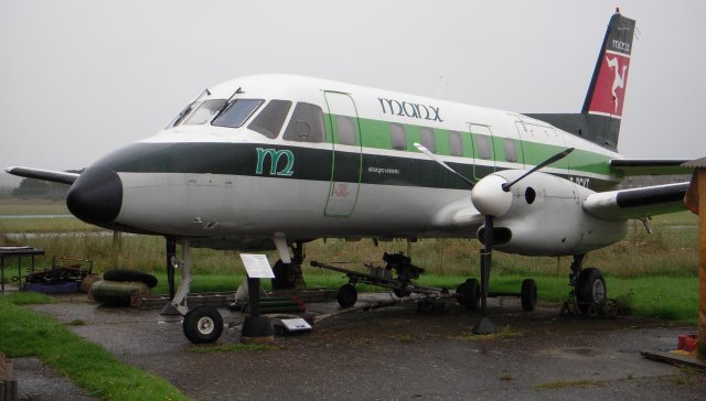 In 1982 the very first flight of Manx Airlines Ltd was made by Embraer Bandeirante G-RLAY, leased from Genair.  However, despite using G-RLAY until 1984, the Brazilian built twin turboprop only ever carried Manx Airline's early livery, as commemorated by G-BGYT, pictured above, rather than the full corporate scheme later applied to it Vickers Viscount and Fokker F27 Friendship fleets.