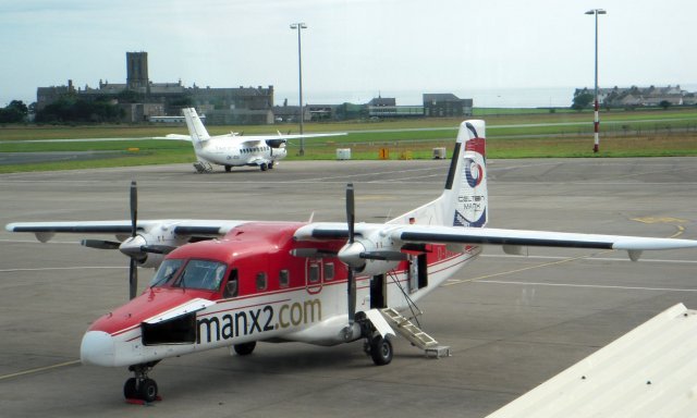 With the church of King William's College to the south of Ronaldsway Airport, D-ILKA made ready to form Manx 2 flight NM610, due to leave Gate 5 at 1715 - while with its tail to the camera was Manx 2's Czech built and registered 1986 vintage Let L 410 UVP-E Turbolet OK-RDA.  Bearing the constructor's number 861813, this aircraft was previously registered in Hungary as HA-YFG and is one of more than 1 100 airframes produced since 1969, initially as a replacement for the Antonov An-2 biplane for Aeroflot.