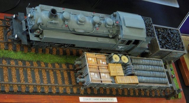 Like the low sided gondola wagon next to it, this 1/35 scale model of Deutsche Reichsbahn 2-8-2T 86 271 in wartime overall grey was made from the Trumpeter kit.  775 Class 86 tank engines were built from 1928 until 1942 with 755 surviving the war and continuing to work in Austria, Poland, East and West Germany until 1974.  From 1943 a simplified Class 86 was built as a "simplified war locomotive" with only one cabside window and disc carrying wheels