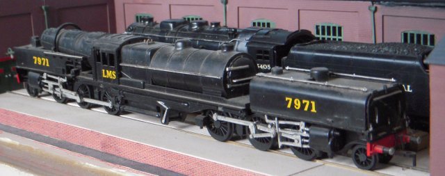 A further thirty of the  locomotives were built between August and November 1930 to the same plans and numbered 4967- 4996 although in 1931 the entire class with the exception of the first two of the 1927 machines were rebuilt with 10 ton capacity conical rotary coal bunkers. These were revolved and oscillated by means of a small 2 cylinder steam engine, thus self-trimming the fuel load and preventing coal dust from entering the cab.
