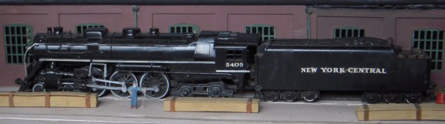 "These locomotives were designed by Paul W. Keifer, New York Central's former Chief Engineer of motive power and rolling stock, following experience with the J1 and J2 Hudsons. 50 were built by the American Locomotive Company in 1937-38, the last 10 had streamlined shrouds but in time the shrouds were later removed. Instead of a straight boiler as used on the J1s and J2s, a conical boiler was used.  The smokebox was shortened by moving the front tube sheet forward, thus making room for a very large combustion chamber in front of the firebox.  This increased the steaming capacity of the boiler.  Baker valve gear was used on all the locomotives.  This type of locomotive hauled the famous passenger train ""20TH CENTURY LIMITED" between New York and Chicago, covering the 961 miles in 960 minutes."
