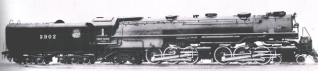 Variations on this theme include the 4-6-6-4 wheel arrangement - as used by the Union Pacific Railroad on its Challenger Class locomotives - which has two separate groups of six driving wheels between four wheeled carrying bogies. Although the front group of driving wheels on these locomotives are hinged relative to the rear group - which remain fixed to the chassis and boiler - to allow such a long vehicle to negotiate curves, both groups of driving wheels are powered by live steam rather than Anatole Mallet's original concept of the exhaust steam from the front cylinders being fed to low pressure cylinders at the rear.  The Union Pacific Challengers (pictured above) must therefore be considered only as semi-Mallets.