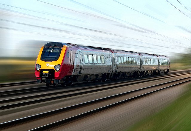 In addition, while the express passenger train services are still comprised of long trains – including the High Speed Trains – some of the passenger services are now much shorter than they used to be, in the sense that they have fewer carriages for each train service. Pictured above is an example of one short, imported kind of train, affectionately known as the Voyager, which has replaced some of the High Speed Trains. These trains also have a maximum service speed of 125mph; however, they certainly do not go quite as fast as my photographic editing and manipulation suggests! 
