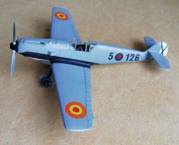 Another version of Spanish Nationalist markings is sported by this BF 109 E-1. Like the Spitfire, the Me 109 was produced before during and after World War 2 and although not always as fast or agile as its Supermarine rival it could climb, dive and loop more easily, partly due to its direct injection engine.