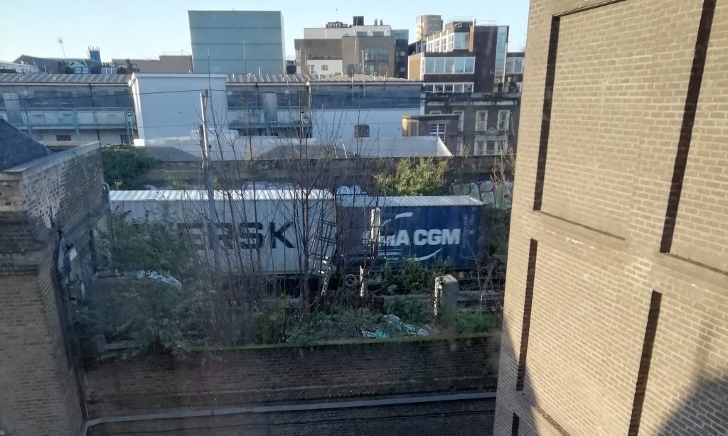 From Room 316 of the Hackney Central Travelodge I had a view of the North London Line from Homerton to Dalston Kingsland, passenger traffic being formed mainly by Class 378 Capitalstar emus along with diesel locomotives such as 70 010 and 66 619 hauling either shipping containers or open box wagons filled with ballast.